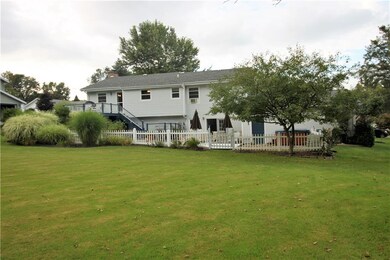 Back of house showing the spacious yard and fenced