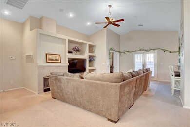 Great room with built-in shelving and surround sou