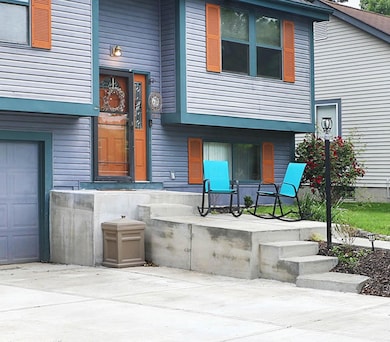 Front Porch & Concrete Driveway