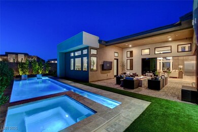 View of pool with an in-ground hot tub, an outdoor