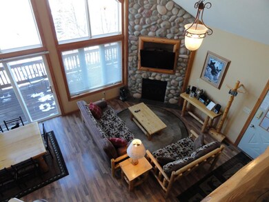 Great room. Open floor plan with vaulted ceilings.