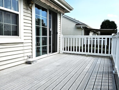 Composite Deck Leads to Sunroom