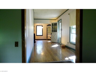 To the left of entering is the large family room a