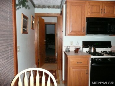 Kitchen thru Bath 1 to Master