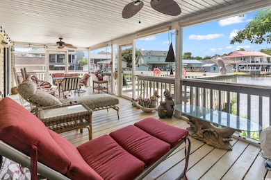 Deck with ceiling fan and a residential view