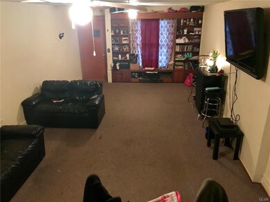 Built-in shelves. Large living area.