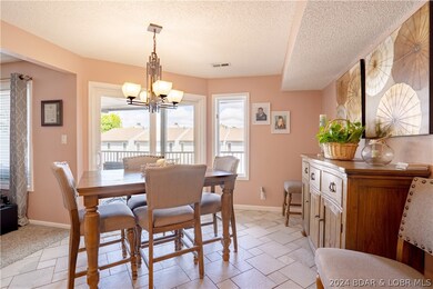 Dining area off kitchen with view of the lake