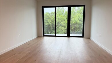 Empty room featuring light wood finished floors a