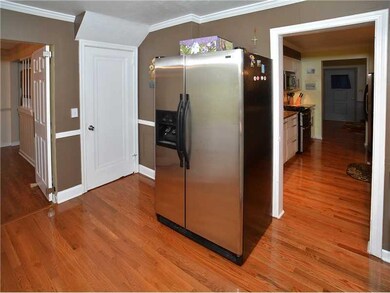 Kitchen. One of the 2 stainless refrigerators whic