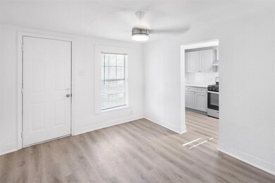 This photo showcases a bright, modern room with li