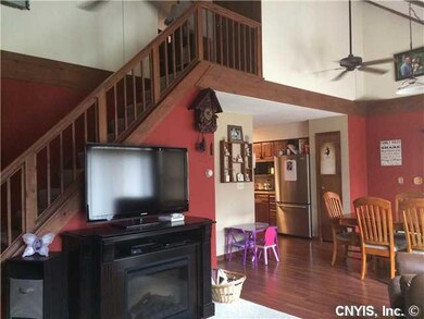 Living Room Cathedral ceilings in living and dinin