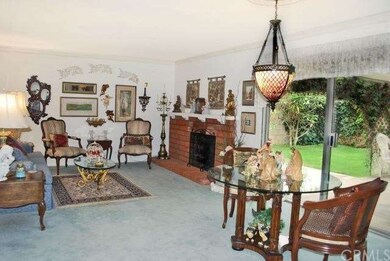 Formal living room with fireplace and direct acces