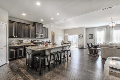WOW! Look at this gorgeous kitchen with 10 foot island!