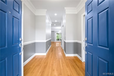 Foyer entrance featuring light wood-style floors,