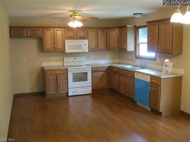Large open country kitchen with ample cabinets and