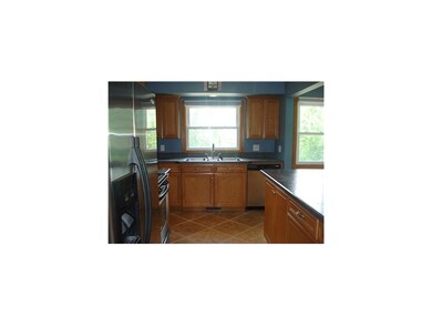 Kitchen. STAINLESS APPLIANCES, TILE FLOOR AND PLEN