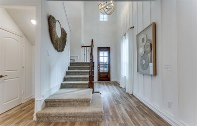 Entry into home *Photos of furnished model. Not ac
