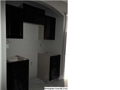 Lot 22, pretty arch over microwave/range