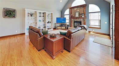 Custom built-ins and stone fireplace in the living room