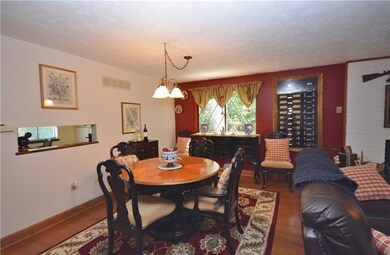 Hardwood continues into dining room. A great space
