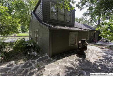 Stone patio area great for a fire pit and some com