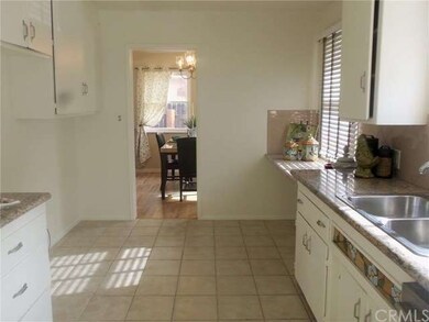 The kitchen has great light and granite counter to