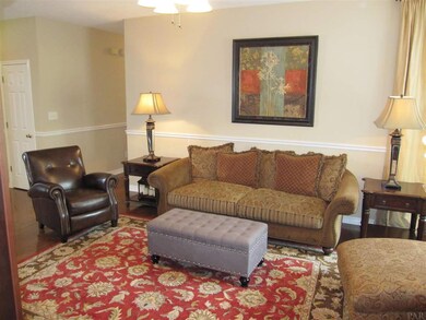 from Fireplace by kitchen. Chair rail, hi ceilings