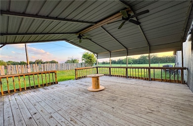 Wooden terrace with ceiling fan