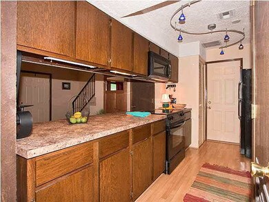 Kitchen view 1. All electric, flat top range, too.