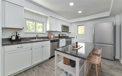 You can easily add a center island in kitchen for