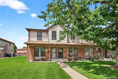 Spacious front and backyard with mature trees.