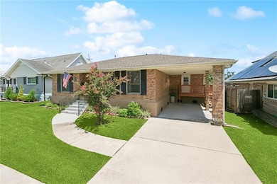 Pull under the carport and enter right to the laundry room for a perfect drop zone area!