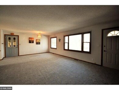 Living room looking toward door that leads to fami