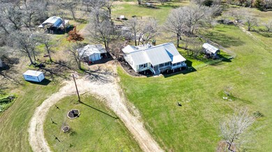 18.63 Acres of potential right here. Several outbu