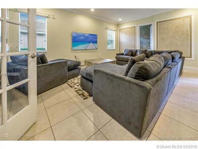 Family Room with Cabana Bath and French doors to a