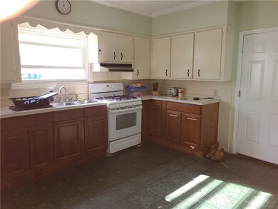 Large kitchen with new lower cabiniets and counter