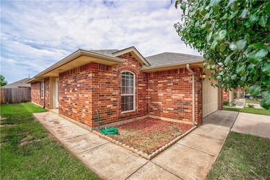 2 car garage and brick exterior
