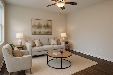 Virtually Staged Den from back door view