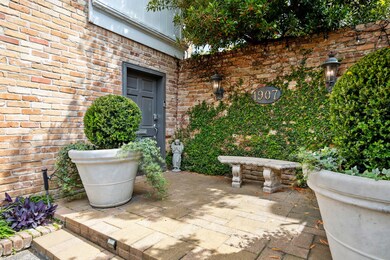 Beautiful landing welcomes guests before the gated door leads to what feels like a secret garden!