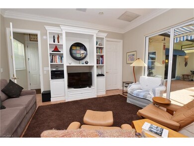 Comfortable Family Room/den just inside the screen