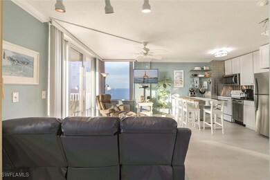 Living room with ceiling fan, light hardwood / woo