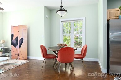 Cheery Dining Area is Central to All the Action