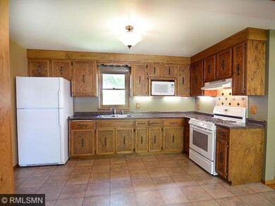 Kitchen opens up to dining room, plenty of room fo