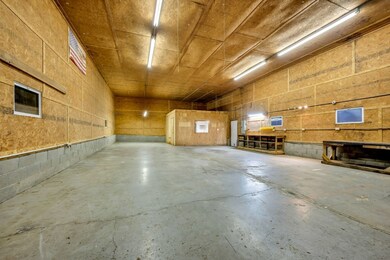 This shows the office partitioned off at the end.