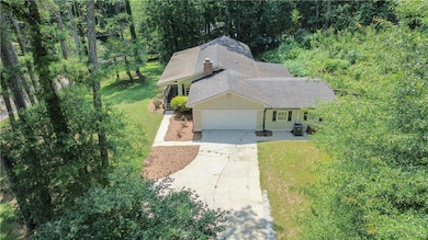 Aerial view of property and surrounding area