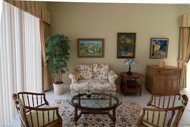 Living area featuring light tile patterned floors