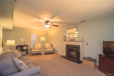 Comfortable family room with wall to wall carpetin
