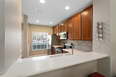 Breakfast Bar opens to dining & family room