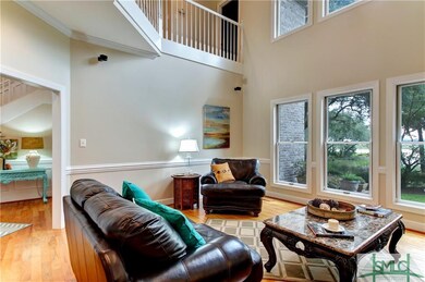 Attractive two story living room with pretty marsh