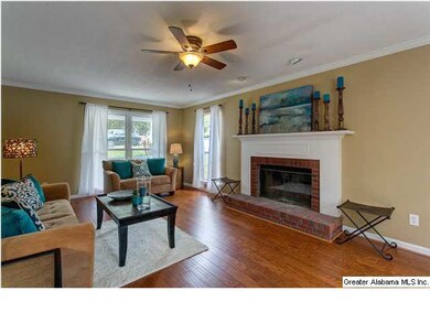 The fireplace makes a cozy focal point